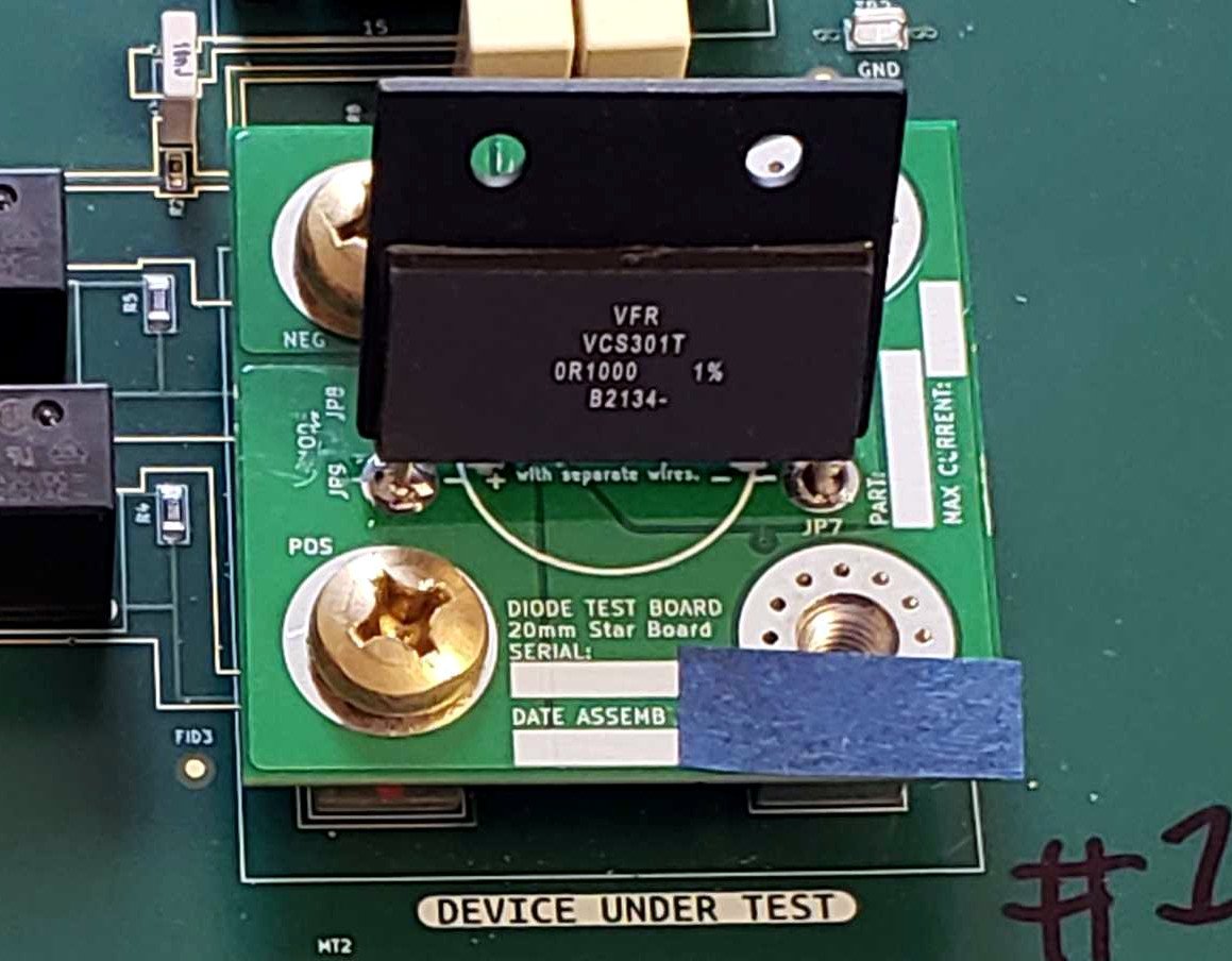 Calibration resistor installed on a DUT board, screwed into Tiny, one of the fixture systems.